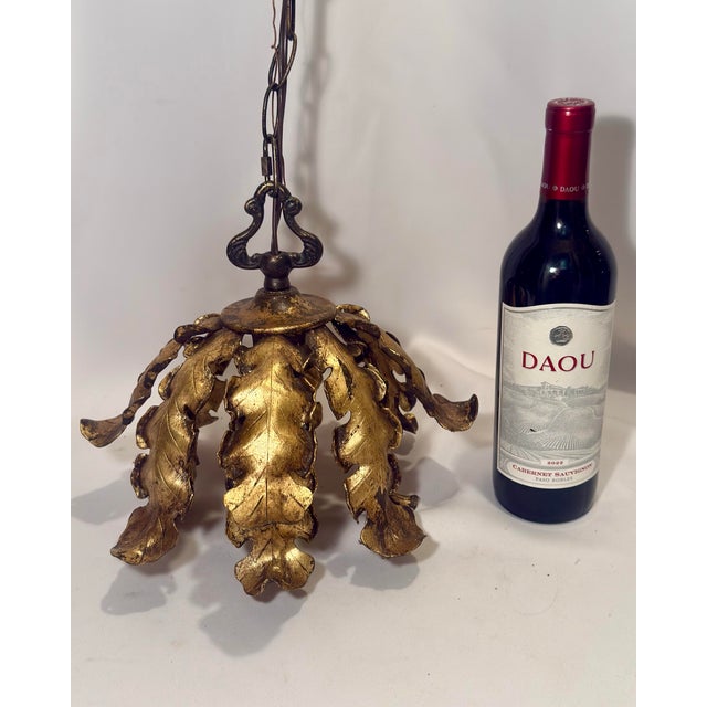 This bespoke Turtle and Crane masterpiece reimagines an authentic vintage iron fixture into a glowing emblem of Hollywood...