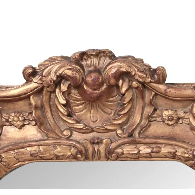 This mirror showcases a rich European classical vintage aesthetic. The frame features intricate and heavy high-relief...