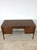This mid century modern writing desk by Broyhill features hardwood construction, walnut veneer with original finish, six...