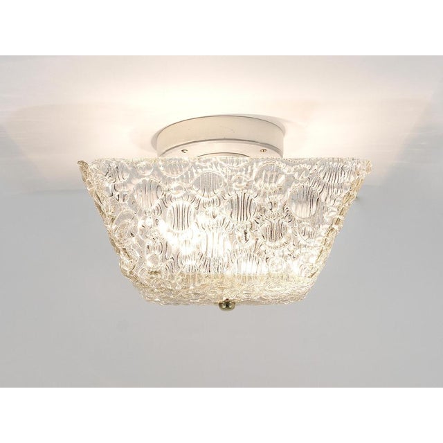 Introducing a charming Mid-Century flush mount or ceiling lamp. Crafted with a square lampshade from textured melting...