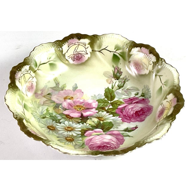 Late 19th century German porcelain bowl Handpainted Peonies and daiseis trimmed with gold, the quality of the painting...
