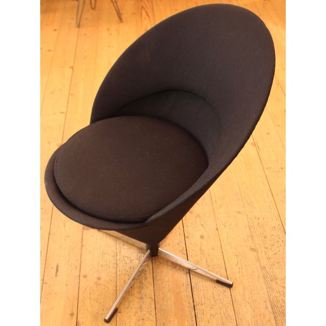 Danish designer Verner Panton designed this iconic Danish modern chair in 1958. In 1967 the chair was manufactured by the...