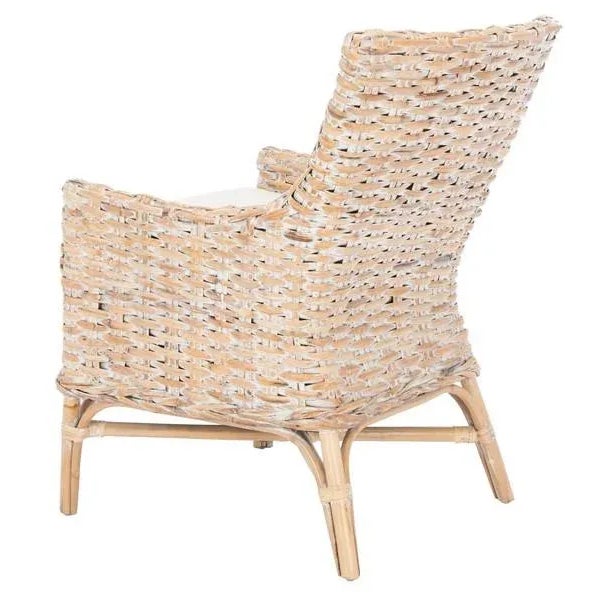 Bring a little boho charm to your décor with this Cristen Accent Chair. Streamlined curves and clean angles juxtapose...