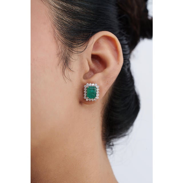 These elegant stud earrings feature 4.39 carats of octagon emeralds, set in 14k yellow gold. Each measuring approximately...