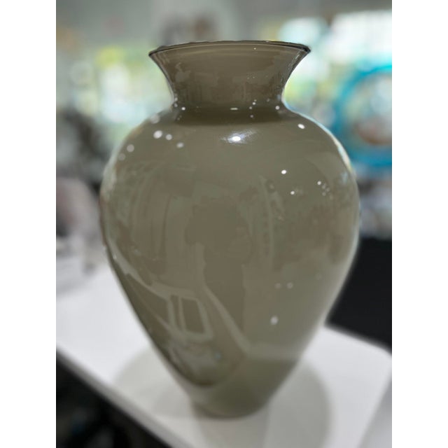 Venini has several designs that they are famous for and the La Buan is one of them. Classic beauty with simple styling....