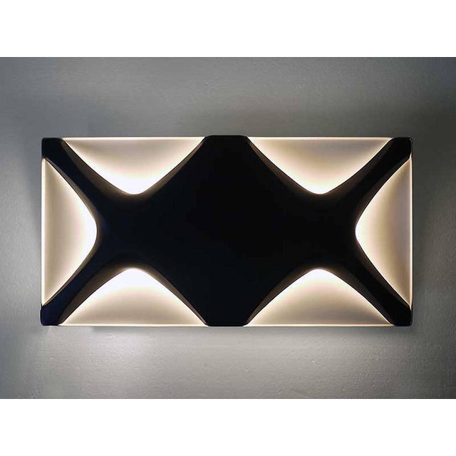 Very rare oyster wall lamp manufactured by klaus link for heinz neuhaus lighting, germany, 1968. Black and white enameled...