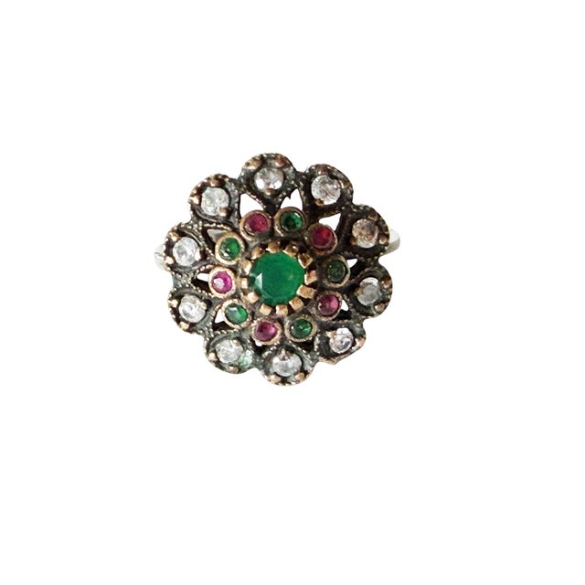 This fabulous vintage hand-made sterling silver statement ring from Jaipur, India features simulated ruby, emerald, and...