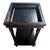 Charming vintage two-tier side table featuring a rich black painted finish with beautifully aged, naturally distressed...