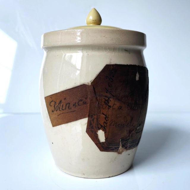A gorgeous antique French apothecary lidded jar, with exquisite handwritten label. This piece is perfect for a French...