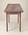 A wonderfully timeworn antique folding worktable, believed to have been used for tailoring, fabric measuring, or general...