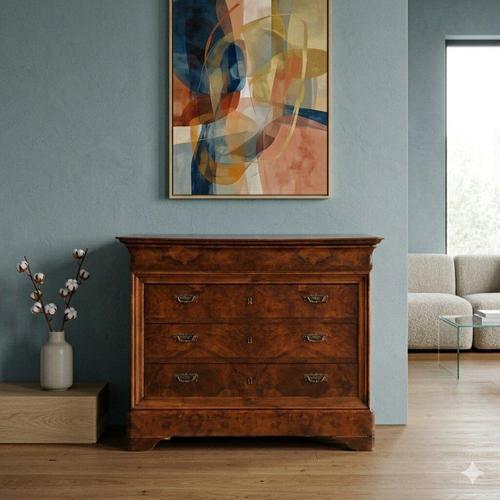 Charles X chest of drawers in walnut and walnut burl. The front has four drawers, the first of which is in the molded band...