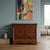Charles X chest of drawers in walnut and walnut burl. The front has four drawers, the first of which is in the molded band...