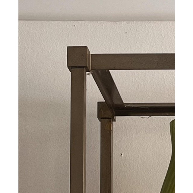 An elegant five-shelf open bookcase, made in Italy in the 1970s. 7 The minimalist, geometric structure is composed of...