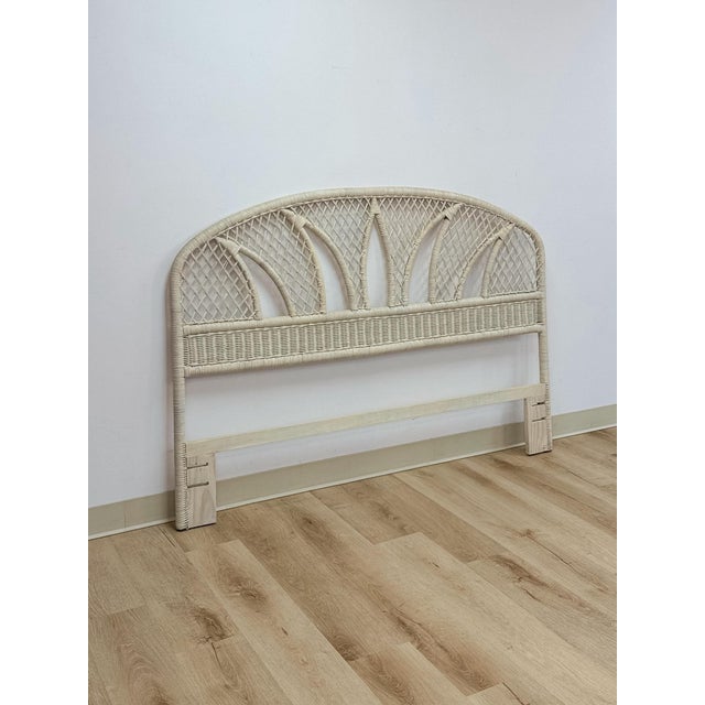 This lovely vintage white wicker arched queen headboard is a warm and beautifully crafted coastal and boho bedroom find....