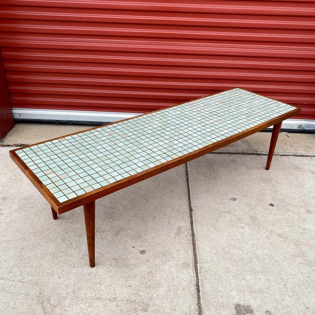 Superb 1960s coffee table by Jane and Gordon Martz for their company Marshall Studios. Well known for their hand-made...