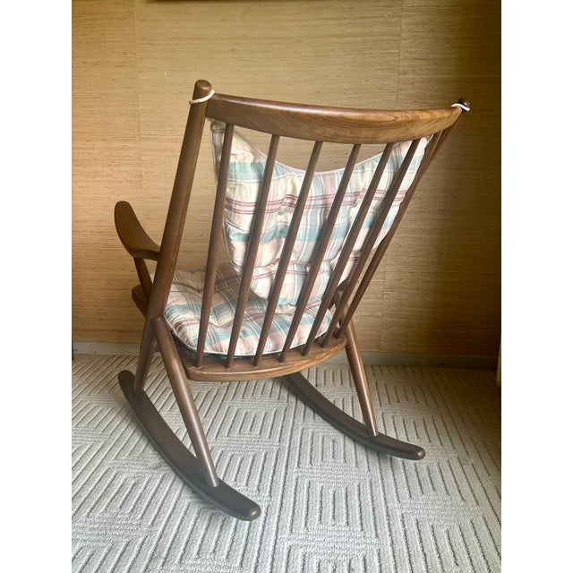An exceptional, collector-grade Model 182 spindle-back rocking chair designed by Frank Reenskaug for Bramin Møbler...