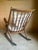 An exceptional, collector-grade Model 182 spindle-back rocking chair designed by Frank Reenskaug for Bramin Møbler...