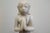 A Burmese Alabaster sculpture of a Buddhist Monk devotee, Buddha. This posture is called Namaskara mudra, or Anjali mudra...