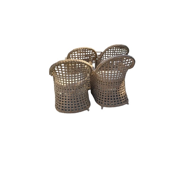 Vintage boho chic set of 4 Drexel Heritage braided woven wicker club chairs. Chairs have a removable cream color cushion.