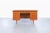 Stunning Danish modern teak desk designed in Denmark, circa 1960s. This desk features four dovetail drawers and a generous...