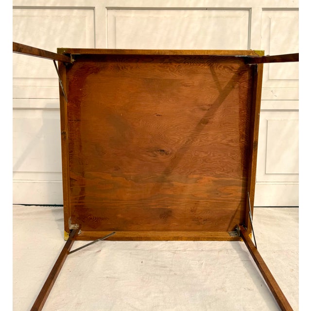 This handcrafted, one-of-a-kind folding game table features a beautifully detailed geometric parquetry top centered with...