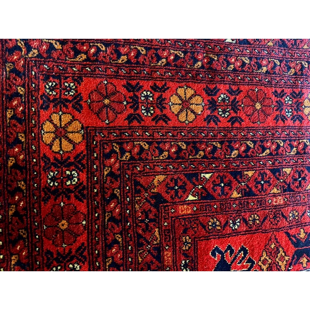 Large 8’5” x 10’ 11” richly colored hand knotted wool area rug from Afghanistan with gorgeous geometric patterns. Turkoman...