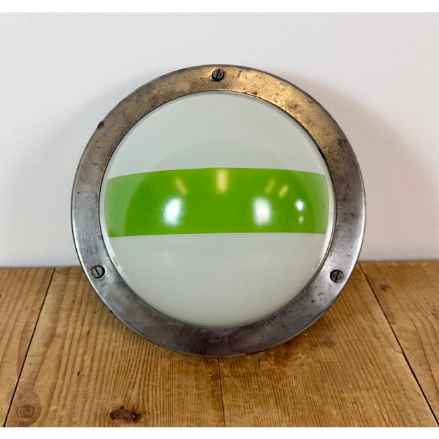Vintage industrial emergency wall light made by Elektrosvit in former Czechoslovakia during the 1970s. It featutes a...