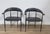 A pair of P40 armchairs, one of Fasem's best-known postmodern designs, created by the Italian design duo Giancarlo Vegni...