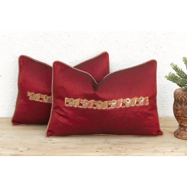 Crafted in India from a lustrous silk-blend textile, this pillow cover is embellished by hand with traditional Zardozi-...
