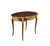 Oval coffee table in mahogany and gilded bronze in the Louis XVI style. Late nineteenth century based on the model of Adam...
