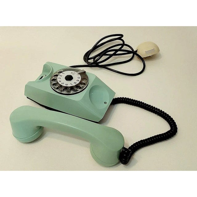 Mid-Century Modern Telephone from Safnat Milano, 1970s, in Very Good conditions. Designed 1970 to 1979 This piece has an...