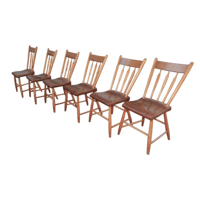 A fairly rare find in a group of six. Farmhouse plank bottom farm chairs. Likely maple. Very good joinery, finish in very...