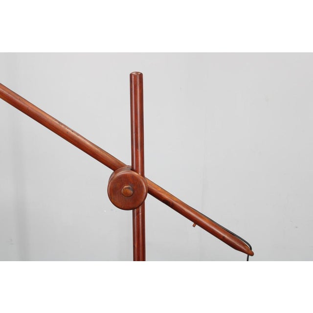 Striking scandinavian mid-century counterbalance floor lamp made in the 1970s, featuring a pine tree frame, authentic...