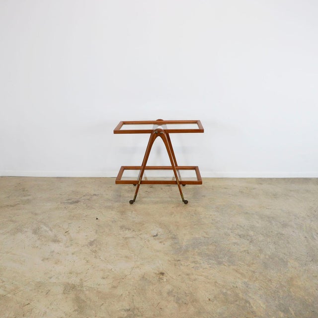 We offer this Italian modernist serving cart, made of first quality cedar wood, with two rectangular shelves and a wooden...