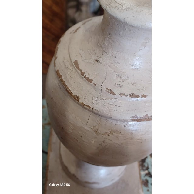 Vintage boho pair of solid wood salvaged balustrade table lamps. Lamps are cream in color with original chippy paint.