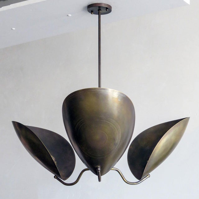 Elegant three shield chandelier 'Chiton-3' designed by Gallery L7, handcrafted and finished in Los Angeles from American...