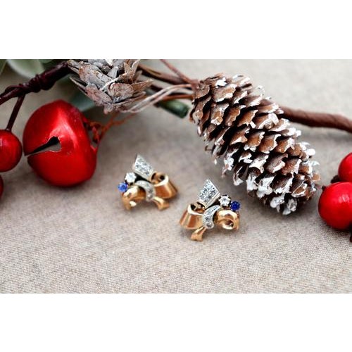 Gold earrings in the shape of a flower with diamond chips and two synthetic garnet stones. Metal: Gold - Silver. Origin:...