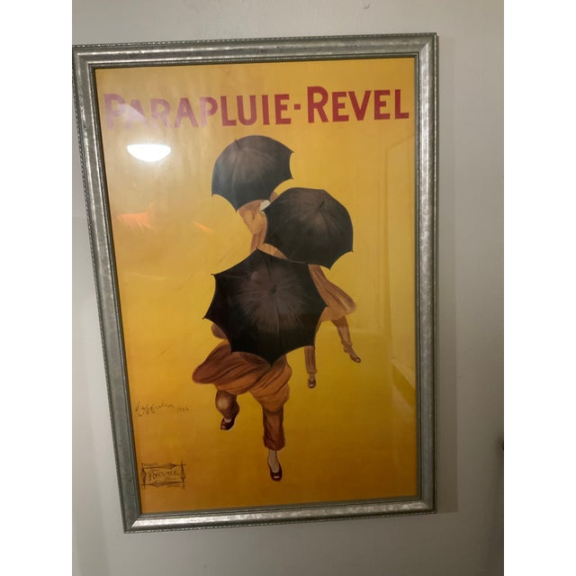 Overview: A striking, large scale, framed reproduction, art print of the iconic 1922 Papuli Ravel French umbrella, ad...