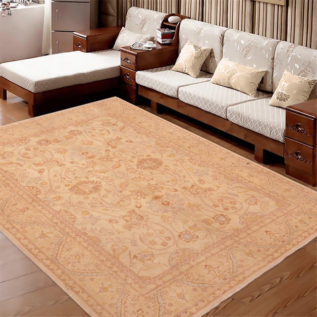Enhance the ambiance of your home with this magnificent Persian-influenced Turkish hand-knotted rug made by skilled...