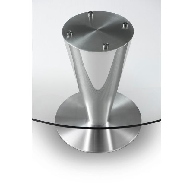 Modern stainless steel round dining table designed by Greg Sheres; "Ocean Drive": In Stock. Sleek and elegant with a...