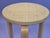 Artek stool 60. Birch with beige reed upholstery. The stool dates from around the 1960s and is in good, used condition....
