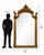 86" H x 50" W. Magnificent oversized giltwood floor mirror with elaborate crest and commanding architectural scale....