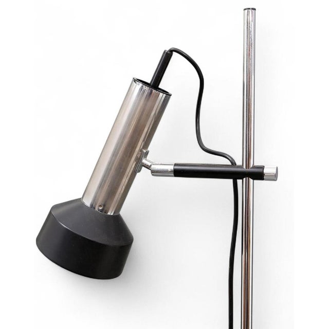 Floor lamp manufactured by Staff Leuchten in Germany, circa 1960s. A versatile and elegant piece with a chrome-plated...
