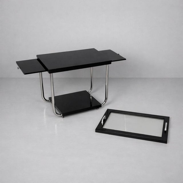 Italian Art Deco cart in black wood, glass and steel, 1930s Double top food cart in black painted wood, glass and steel....