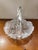 This is a Vintage Cut Crystal Rope Handle Bowl. It measures 6 1/2" high, 8 1/2" wide to the handle ends and 8“ in diameter...