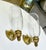 Pair of vintage brass Federal style shield back wall sconces with tall glass hurricane shades by Glo Mar Art Works. Not...