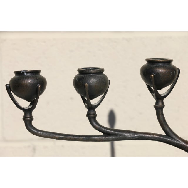 Exceptional Tiffany Studios New York bronze six-light candelabra, dating to the early 20th century, circa 1910s. Designed...