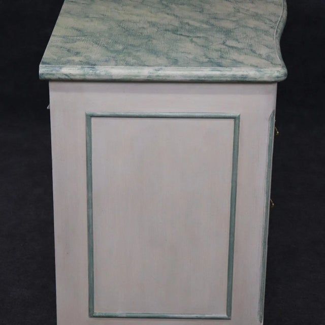 This gorgeous handpainted dresser looks like Baker and is in very good condition. The paint decoration of the faux marble...