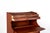 This elegant vintage secretary desk is made of warm teak wood and features a timeless mid-century modern design. It offers...