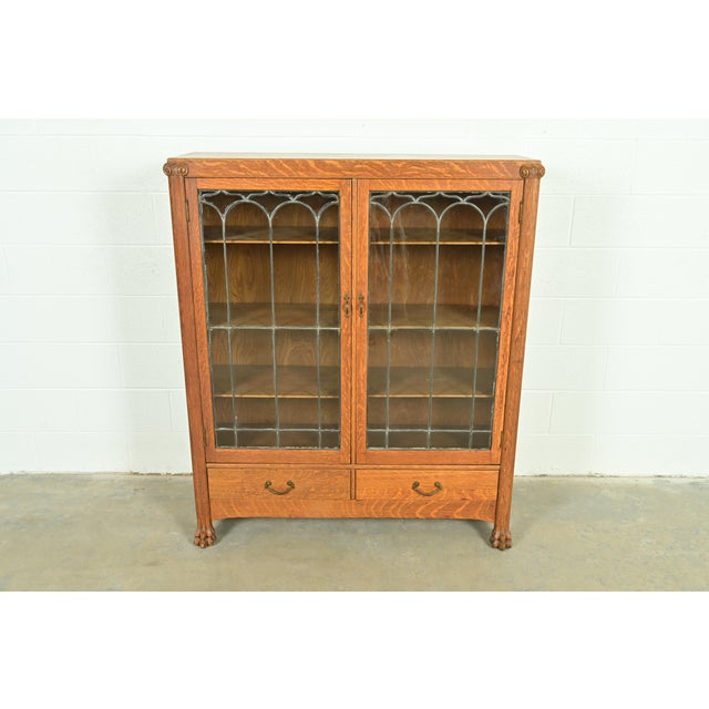 A gorgeous American Empire or Victorian double bookcase cabinet In the manner of R.J. Horner & Co. USA, Circa 1890s Tiger...